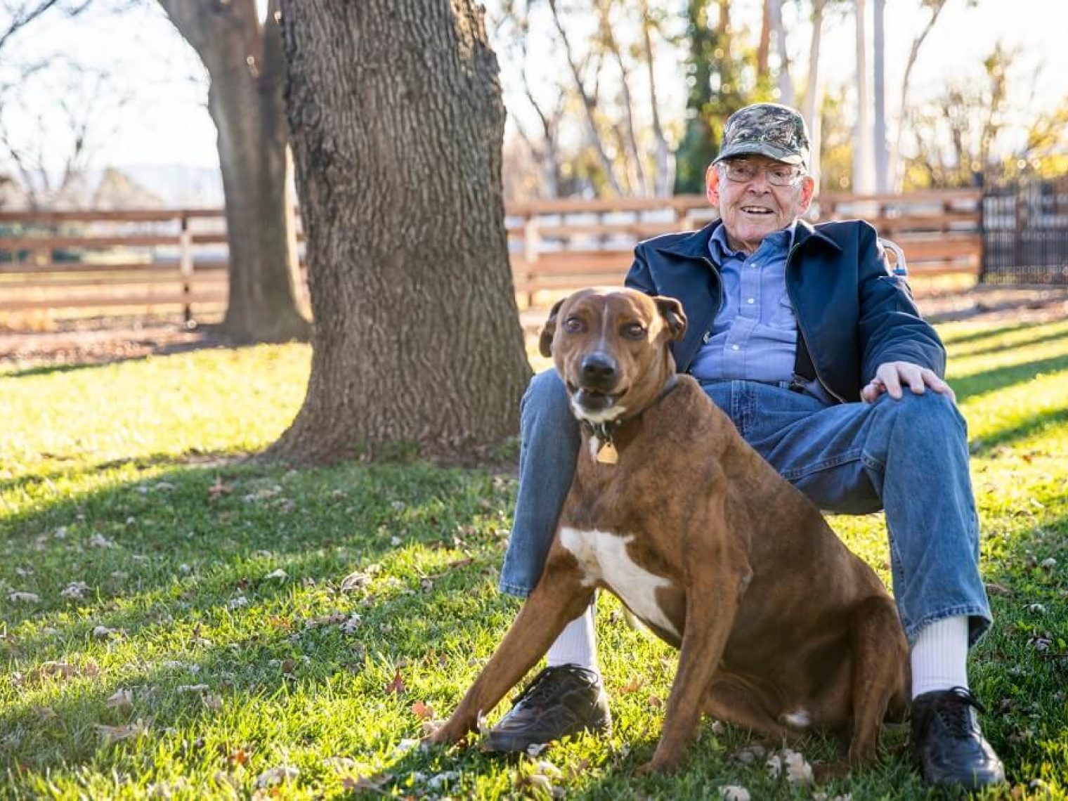 Retired military man with dog.