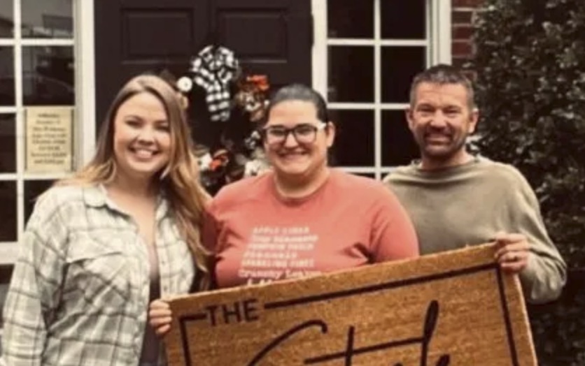 picture of Jason S. in front of a house
